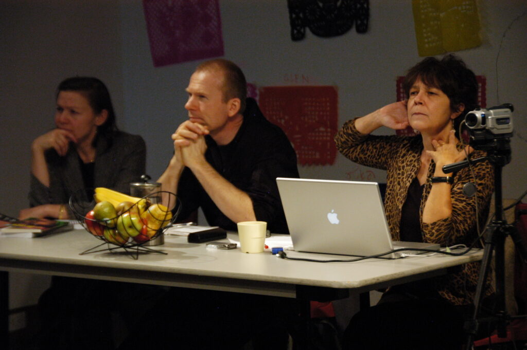 Panelists Annette Arlander and Paul Couillard with moderator Johanna Householder listening to an audience comment at the Terms of Engagement: Presence and the Performative at XPACE Cultural Centre