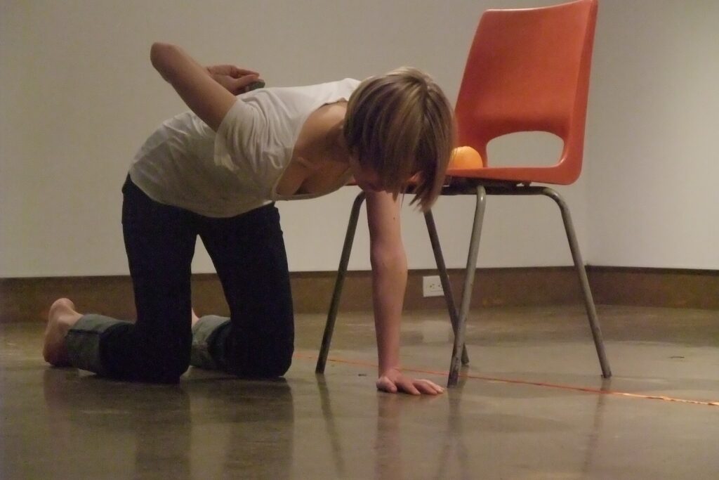 Essi Kausalainen performing Untitled (Toronto) at XPACE Cultural Centre