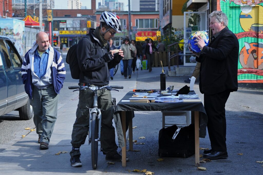 Brian Connolly performing ‘Market Stall Performance’ at Kensington Market.