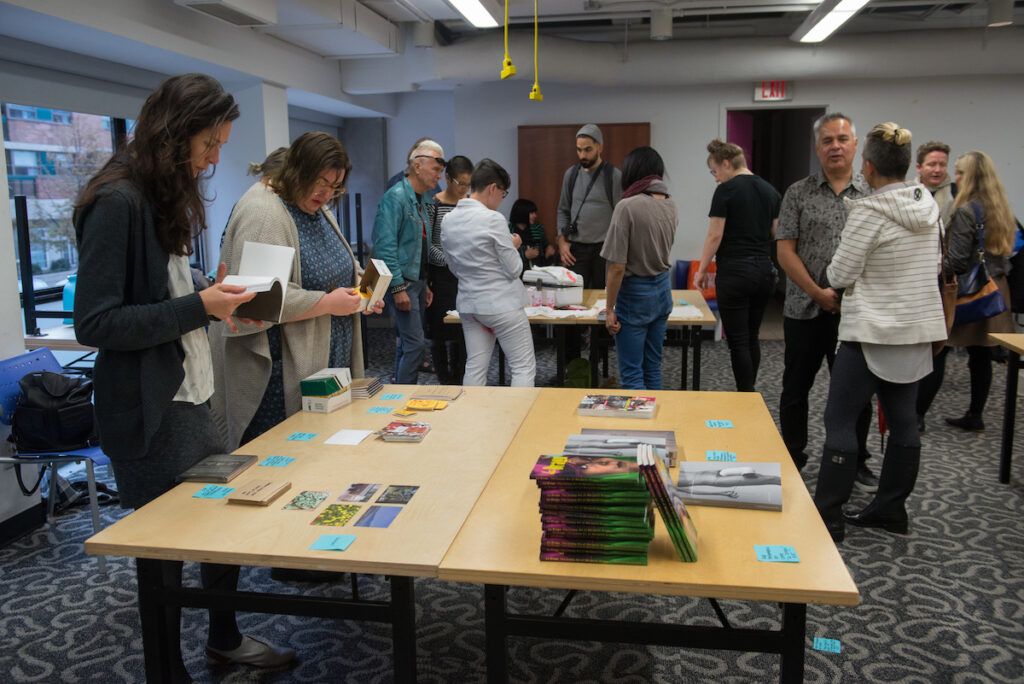 Visitors looking at the displays at 7a*11d's 2016 Publications and Multiples launch