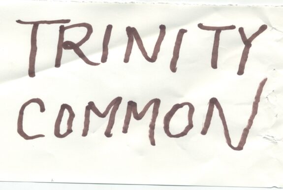 Notebook page from Step 2 with the words 'Trinity Common' in thick black marker