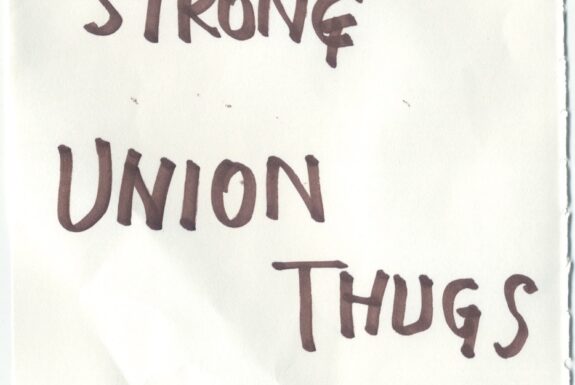 Notebook page from Step 2 with the words 'For the Union makes us strong Union thugs' in thick black marker