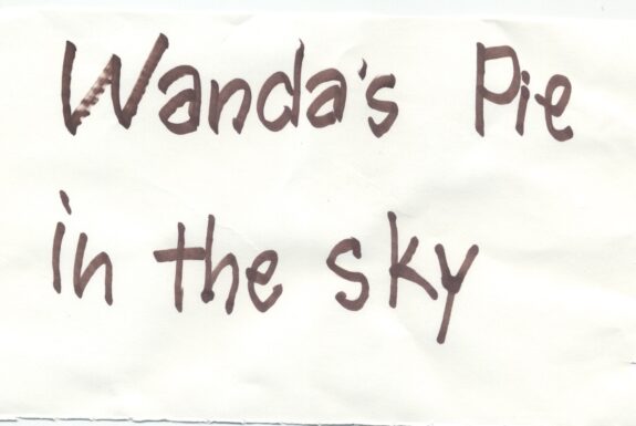 Notebook page from Step 2 with the words 'Wanda's pie in the sky' in thick black marker