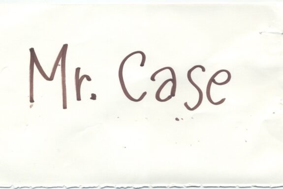Notebook page from Step 2 with the words 'Mr. Case' in thick black marker