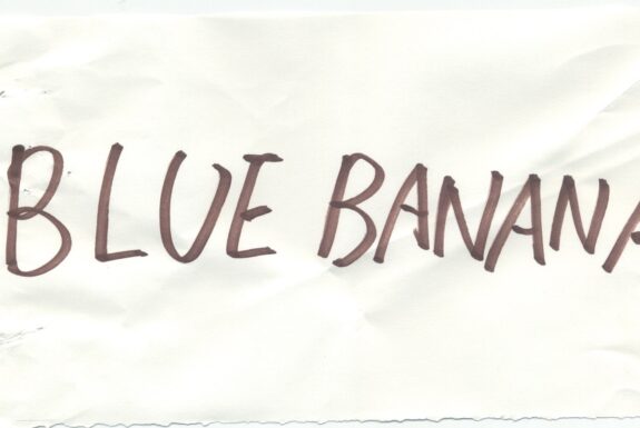 Notebook page from Step 2 with the words 'Blue banana' in thick black marker