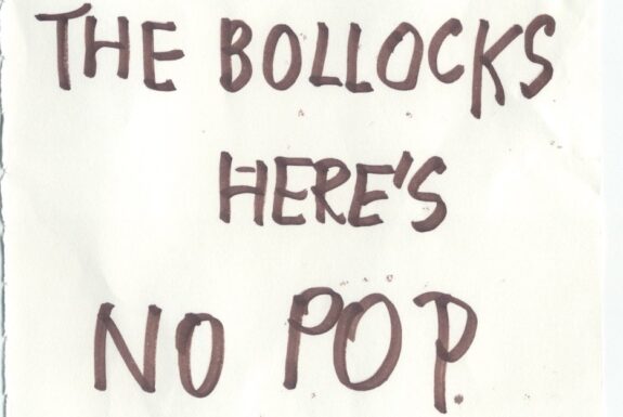 Notebook page from Step 2 with the words 'Never Mind the Bollocks Here's No Pop' in thick black marker