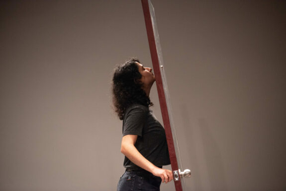 Abedar Kamgari performs Untitled (door performance at FADO Performance Art Centre's Score of Scores.